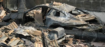 http://www.autospies.com/images/users/omarrana/ferrari_porsche_burned_souther_cali_fire.jpg