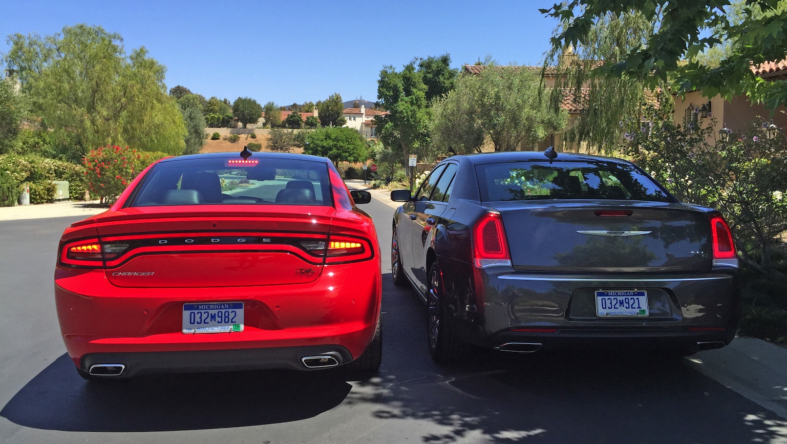 CAR WARS! Chrysler 300c vs. Dodge Charger. Which Car Has