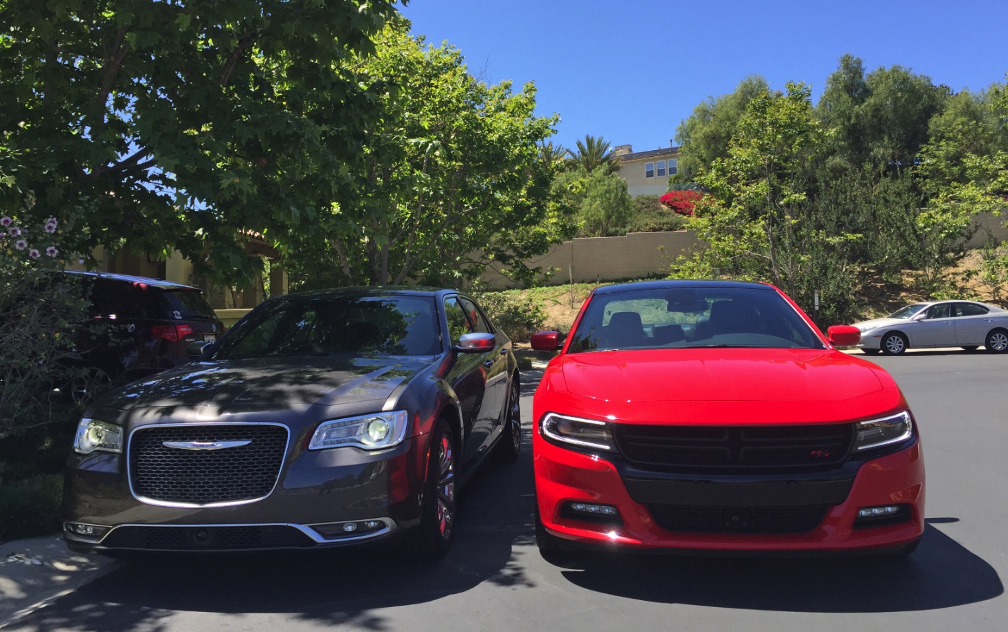 CAR WARS! Chrysler 300c vs. Dodge Charger. Which Car Has