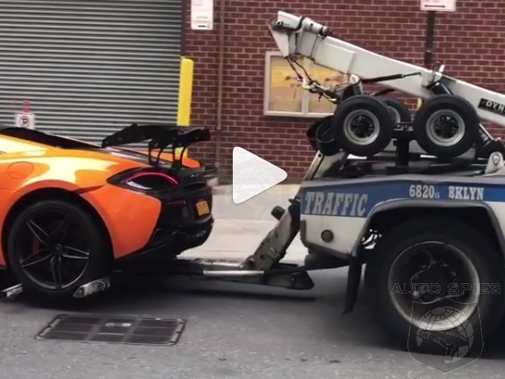OUCH: Proof That Even If You Street Park Your McLaren 570S The NYPD Has NO Problem Towing It Like ANY Other Car
